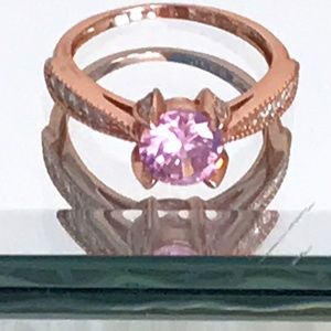NWOT Rose Gold Tone Women’s Ring With Rose Coloured Princess Cut Centrepiece